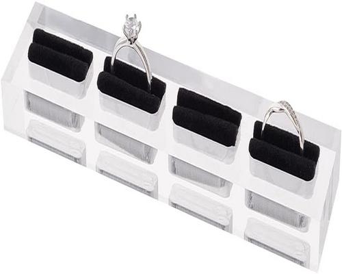 <notranslate>un Support De Bague En Acrylique À 4 Emplacements Avec Velours Noir</notranslate>
